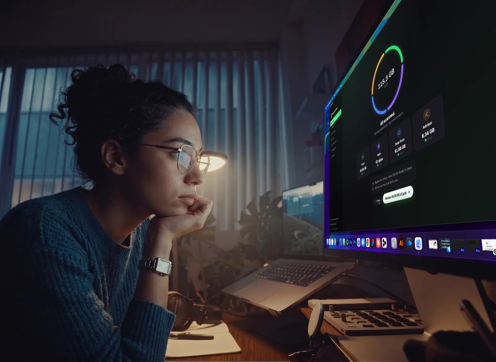 A person reviewing storage in SpaceUp Mac on a display in the evening